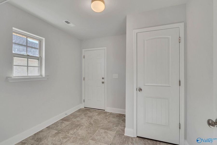 Representative unfurnished interior of a home built from the 2200 by Adams Homes in Winding Oaks, Weeki Wachee (Image 35). Representative unfurnished interior of a home built from the 2200 by Adams Homes in Winding Oaks, Weeki Wachee (Image 35).