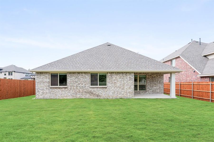 Exterior details and patio area of a home in Parks of Aledo, Aledo (Image 26).