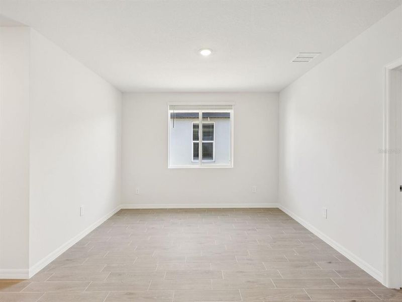 Spacious, unfurnished interior of a new home in Oakfield Trails - Classic Series, Parrish (Image 11).