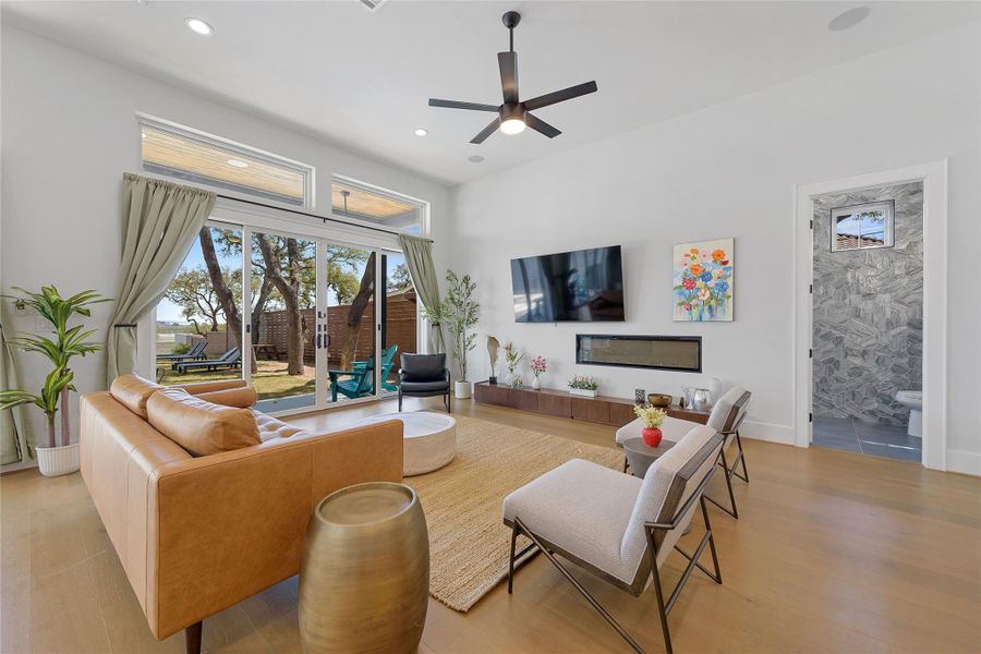 Spacious and light-filled living room with panoramic Hill Country views, soaring ceilings, and seamless indoor-outdoor flow. Perfectly designed for relaxing or entertaining, this open-concept space brings the beauty of Canyon Lake right to your doorstep