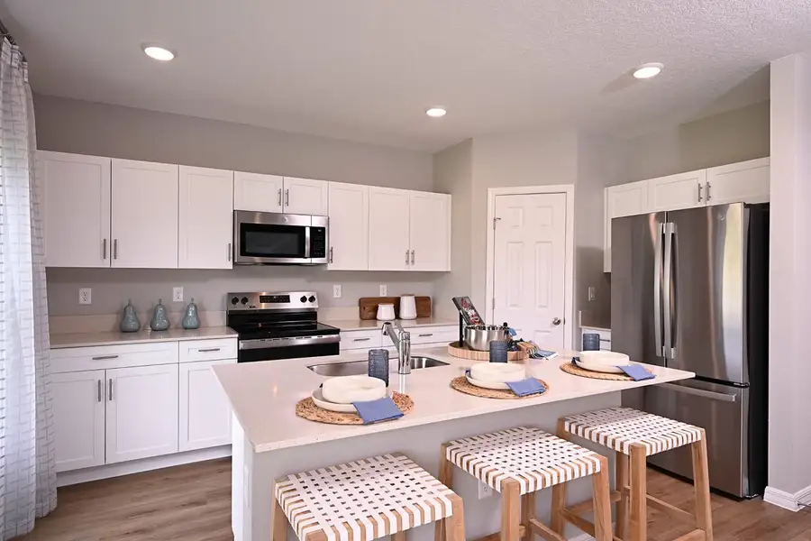 Furnished interior view inside a new home in Scenic Terrace, Haines City (Image 3).