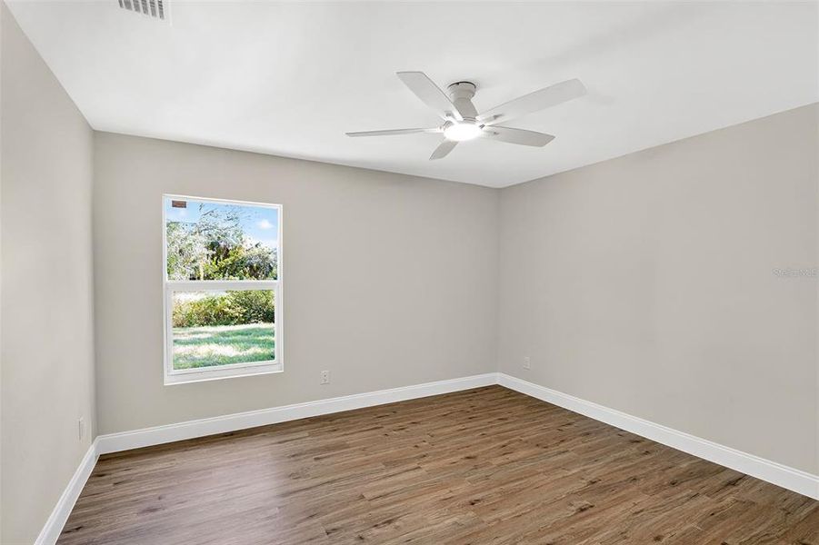 Spacious, unfurnished interior of a new home in , Port Charlotte (Image 26).