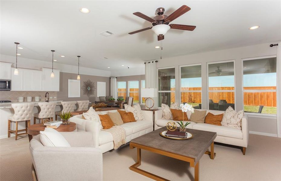 Bright and inviting gathering room perfect for entertaining *Model representation
