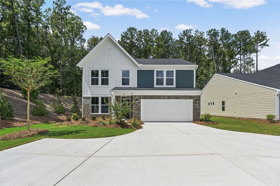Front exterior of a new home in Easton Park, Dallas, GA, highlighting curb appeal (Image 23). Front exterior of a new home in Easton Park, Dallas, GA, highlighting curb appeal (Image 23).
