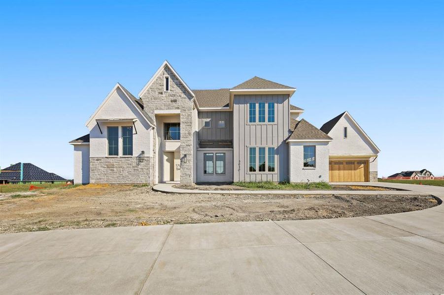 Front exterior of a home in the Harper Estates community, located in Celina, TX (Image 2).