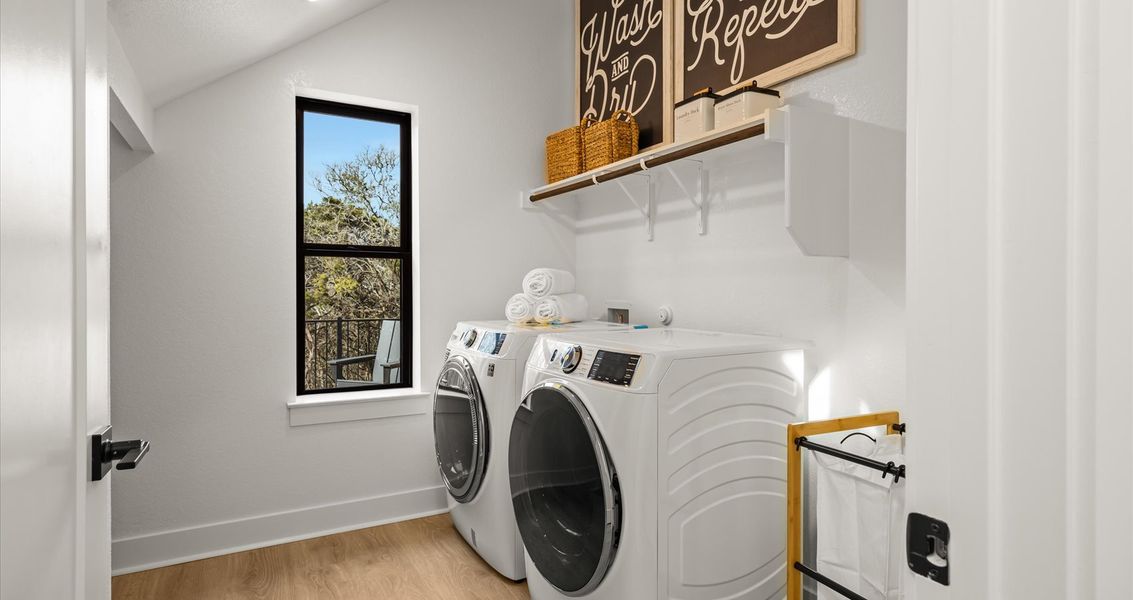 Furnished interior view inside a new home in 6 Creeks, Kyle (Image 16).