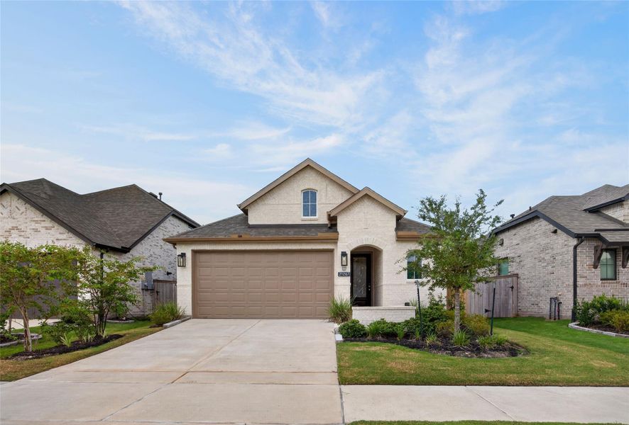 Front exterior of a new home in , Cypress, TX, highlighting curb appeal (Image 2). Front exterior of a new home in , Cypress, TX, highlighting curb appeal (Image 2).