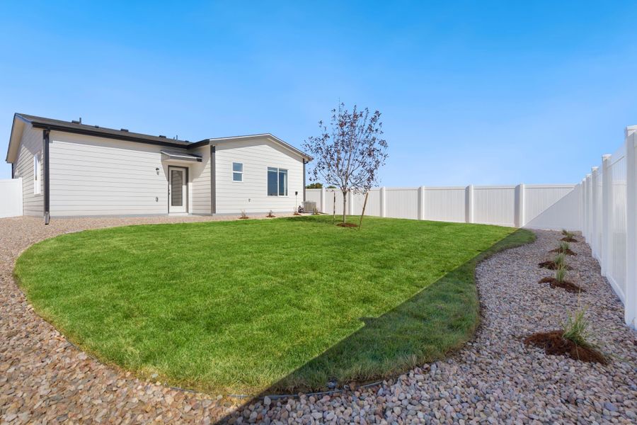Representative exterior photo of a completed home built from the Camden by Baessler Homes in Sage Meadows, Wellington, CO (Image 19). Representative exterior photo of a completed home built from the Camden by Baessler Homes in Sage Meadows, Wellington, CO (Image 19).