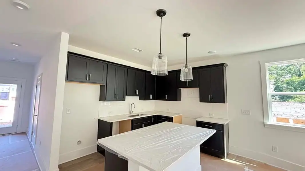 Kitchen featuring Industrial Collection Finishes Construction Progress