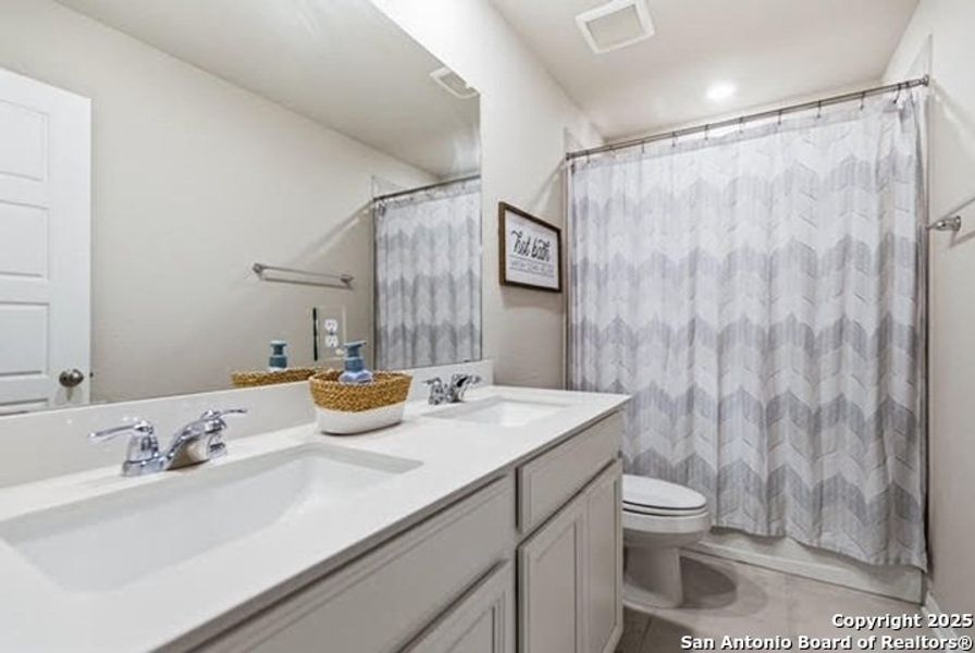 Furnished interior view inside a new home in Legendary Trails - Premier Series, Cibolo (Image 17). Furnished interior view inside a new home in Legendary Trails - Premier Series, Cibolo (Image 17).