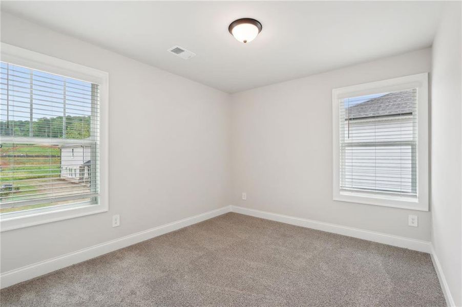 Spacious, unfurnished interior of a new home in Hemingway - Reserve Series, Cumming (Image 43).