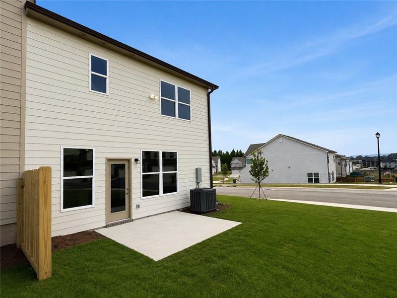 Exterior details and patio area of a home in Somerset at Riverbrook, Gainesville (Image 4).