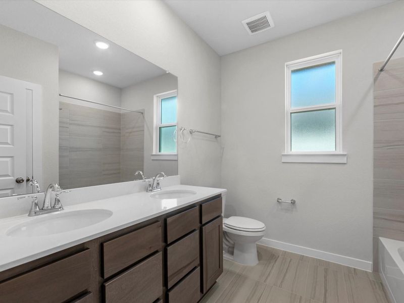 Furnished interior view inside a new home in Mason Woods, Cypress (Image 5).