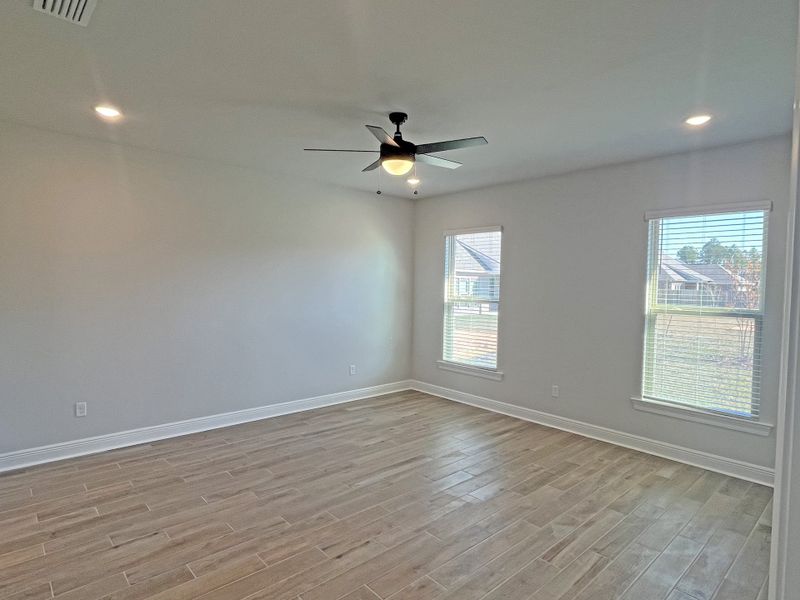Spacious, unfurnished interior of a new home in Bird Song at Hammock Bay, Freeport (Image 14).