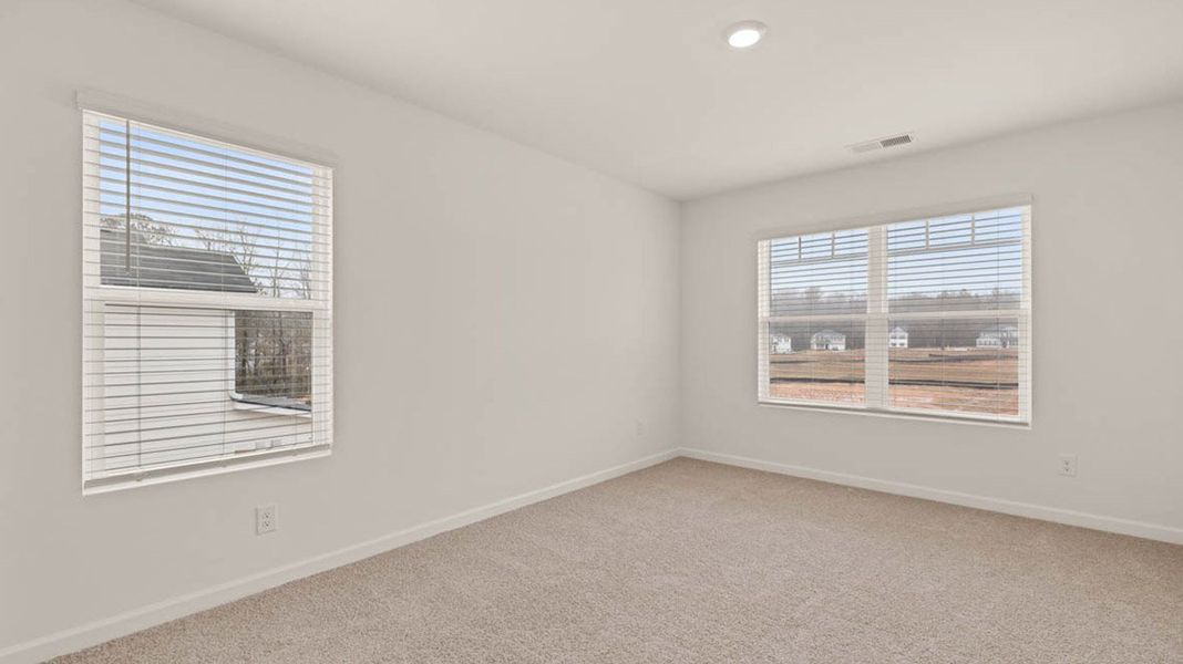 Representative unfurnished interior of a home built from the Packard by D.R. Horton in Evergreen Crossing, Locust Grove (Image 33).
