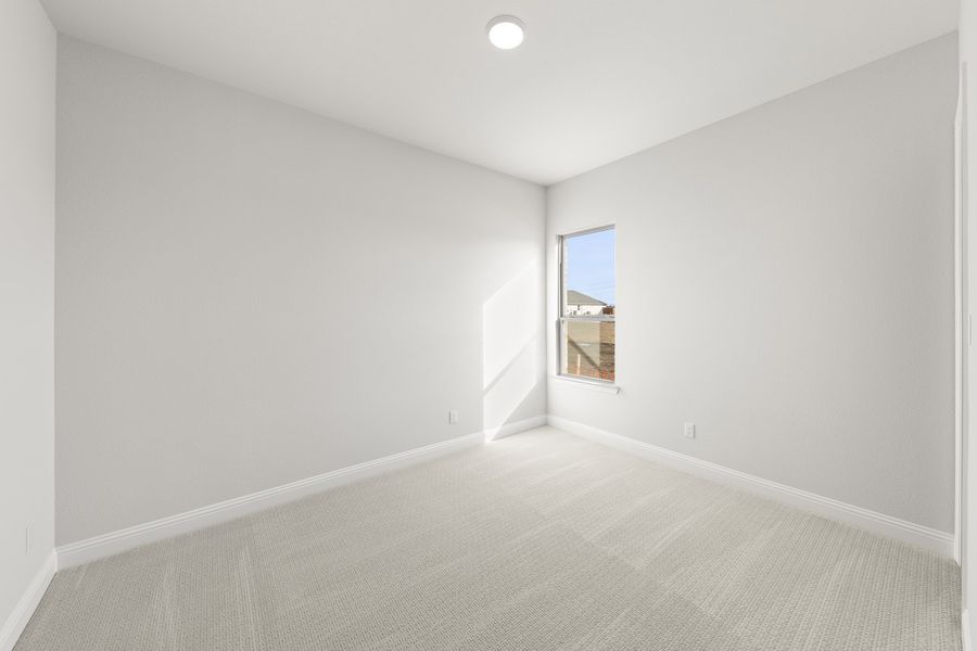 Representative unfurnished interior of a home built from the Glen Rose by Windsor Homes in Anna Town Square, Anna (Image 28).