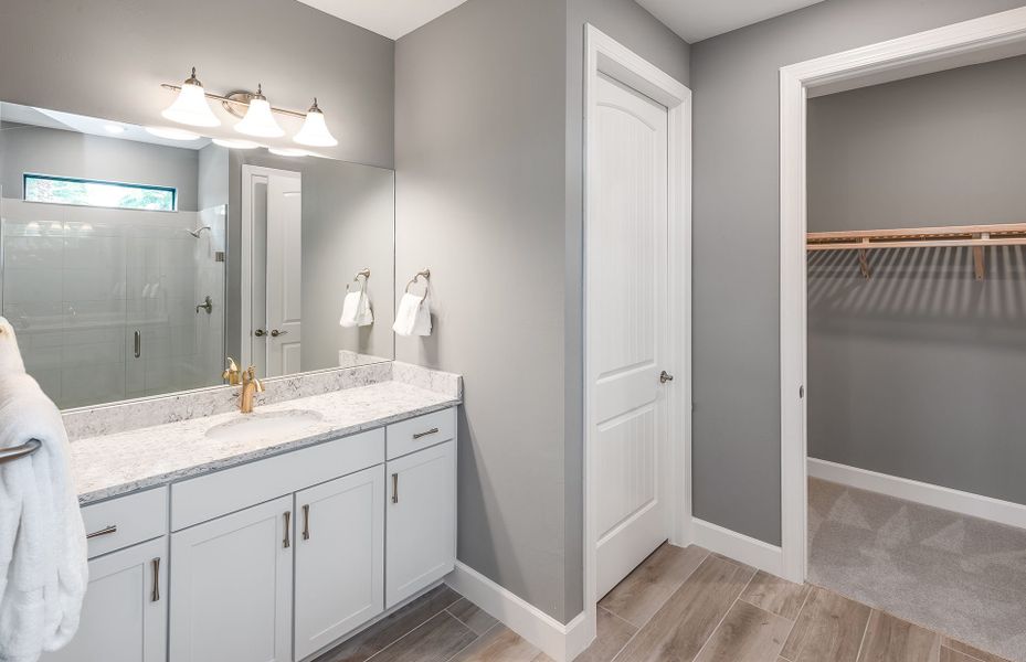 Representative furnished interior of a home built from the Stardom by DiVosta in Avondale at Avenir, Palm Beach Gardens (Image 25).