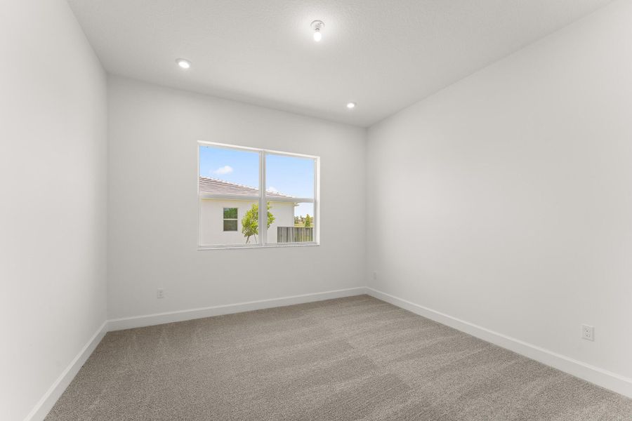 Spacious, unfurnished interior of a new home in Tradition - Seville, Port St. Lucie (Image 12).