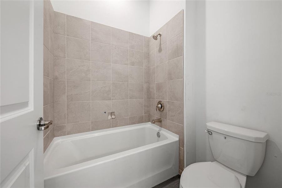 Furnished interior view inside a new home in Calusa Country Club, Lakewood Ranch (Image 7).