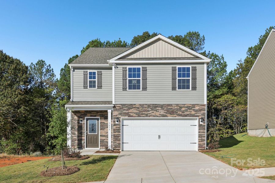 Front exterior of a new home in Cline Village, Hickory, NC, highlighting curb appeal (Image 1).