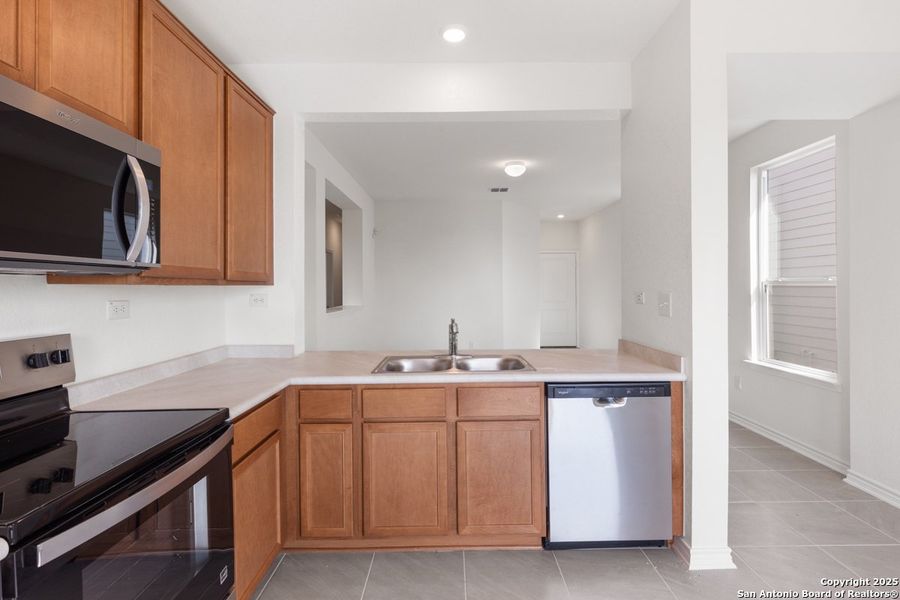 Furnished interior view inside a new home in Southton Cove, Elmendorf (Image 6). Furnished interior view inside a new home in Southton Cove, Elmendorf (Image 6).
