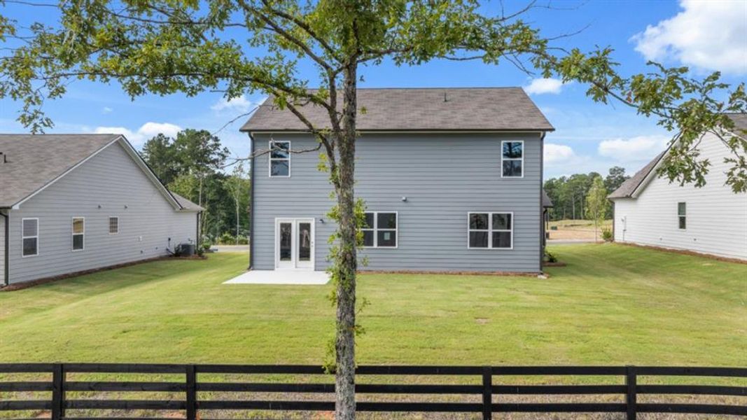 Exterior details and patio area of a home in Fairway 17 at Mirror Lake, Villa Rica (Image 24). Exterior details and patio area of a home in Fairway 17 at Mirror Lake, Villa Rica (Image 24).