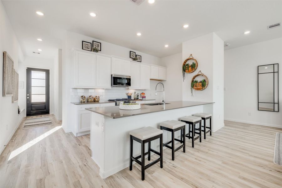 Furnished interior view inside a new home in Bridgeland, Cypress (Image 22).