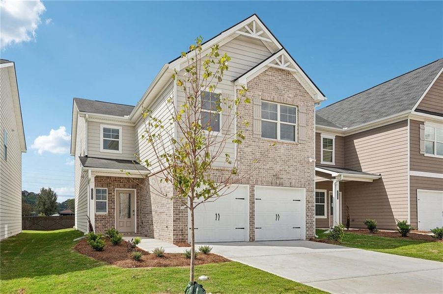 Front exterior of a new home in Fairview Lake, Conyers, GA, highlighting curb appeal (Image 27).