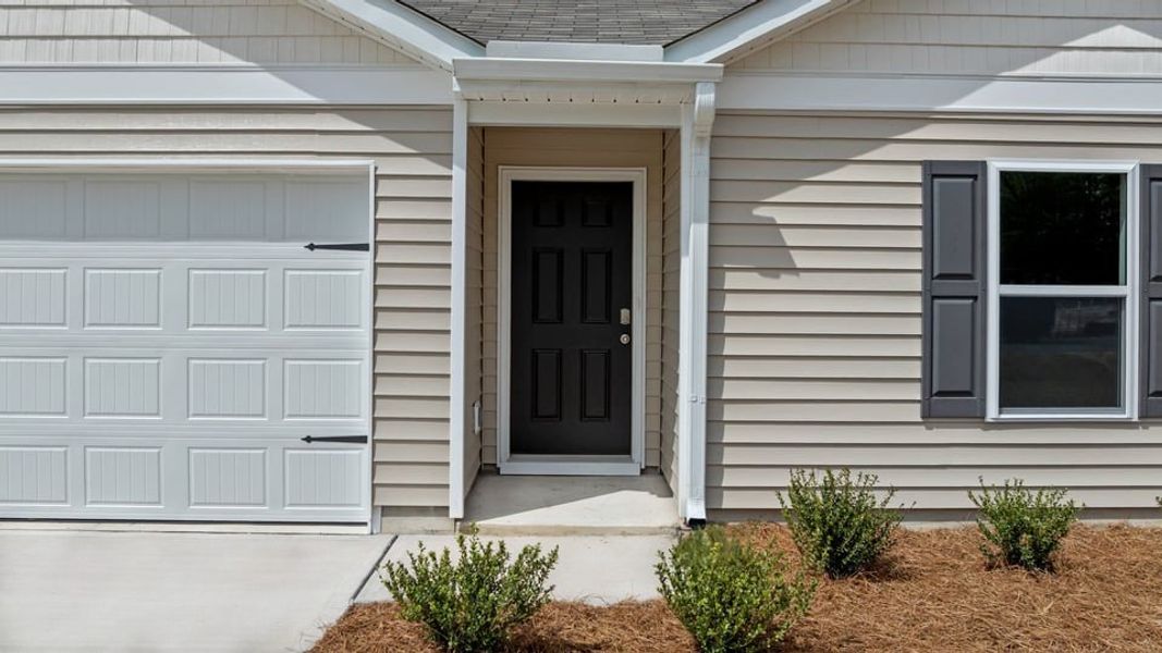Exterior details and patio area of a home in Jetstream Park, Wilson (Image 3).