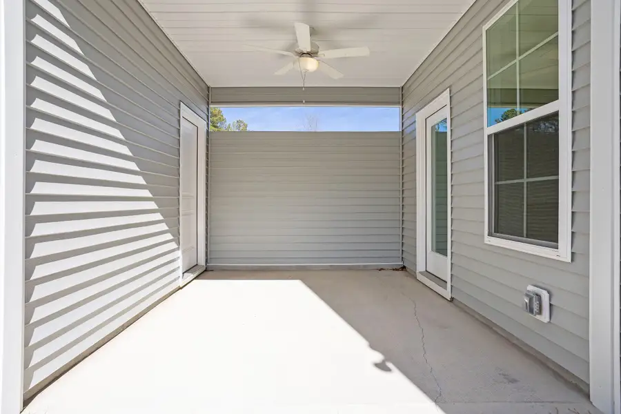 Exterior details and patio area of a home in Renaissance at White Oak, Garner (Image 4).