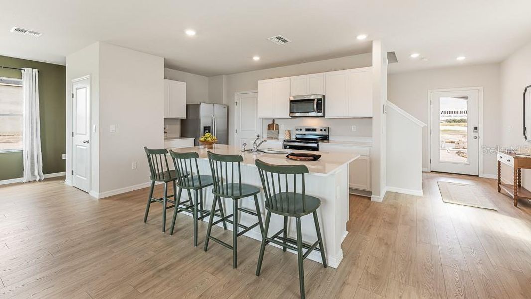 Furnished interior view inside a new home in Bella Lago, Parrish (Image 4).
