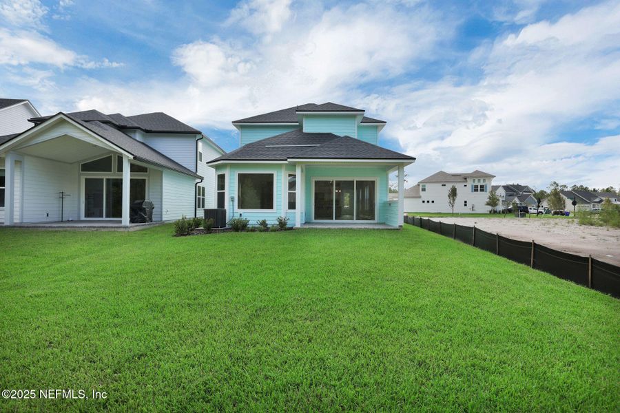 Exterior details and patio area of a home in Reflections at Nocatee, Ponte Vedra (Image 3).