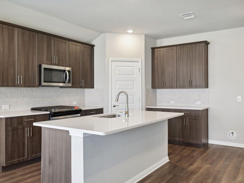 Photo is not of the actual home, but is an inspirational photo of builder’s model home and may depict options, furnishings, and/or decorator features that are not included