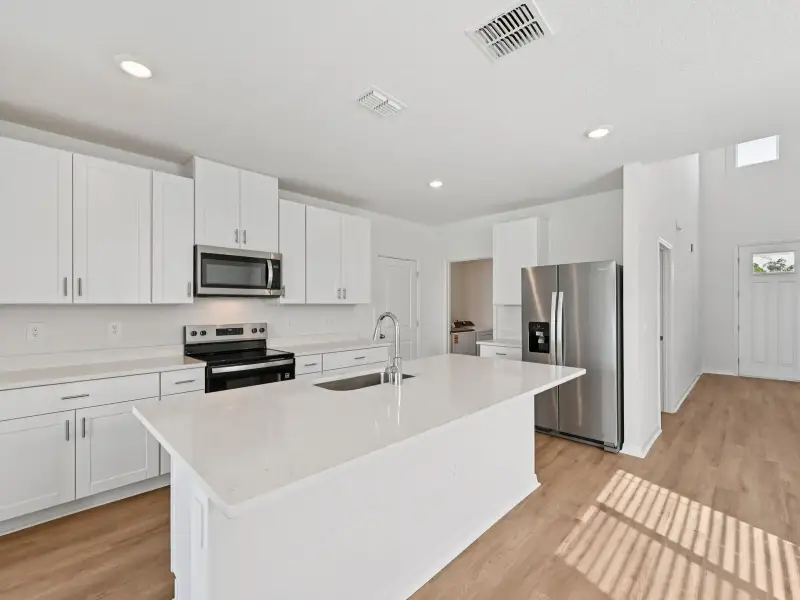 Furnished interior view inside a new home in Salt Meadows - Premier Series, Parrish (Image 4).