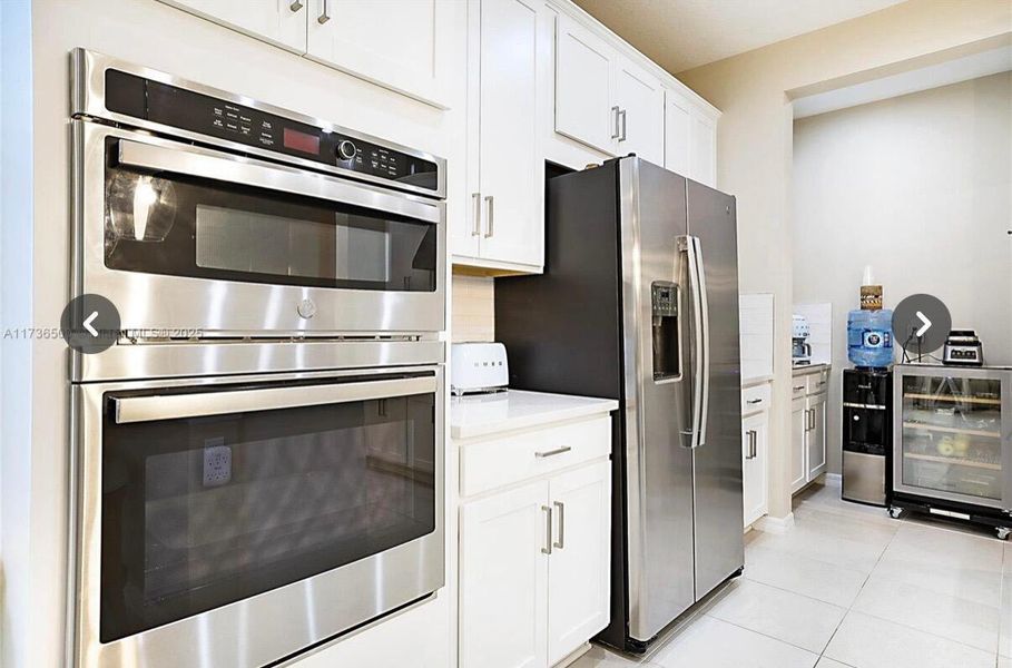 Furnished interior view inside a new home in , Port St. Lucie (Image 24).