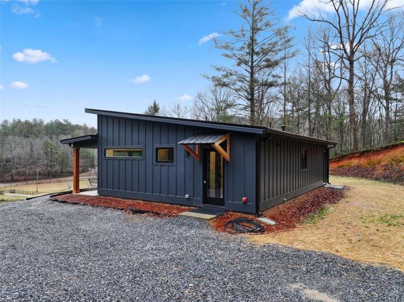 Exterior details and patio area of a home in , Ellijay (Image 18).