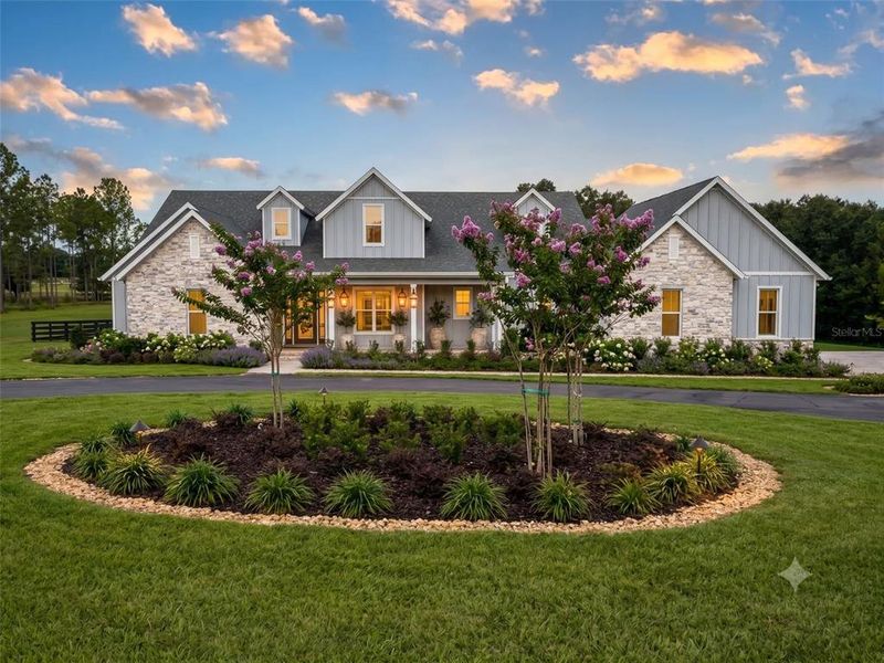 Front exterior of a new home in , Lithia, FL, highlighting curb appeal (Image 20).