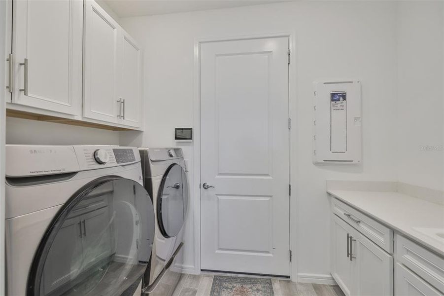 Furnished interior view inside a new home in Del Webb BayView, Parrish (Image 31).