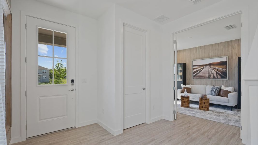 Entry and flex room/study in a DRB Home Clementine model at the Trinity Place community.