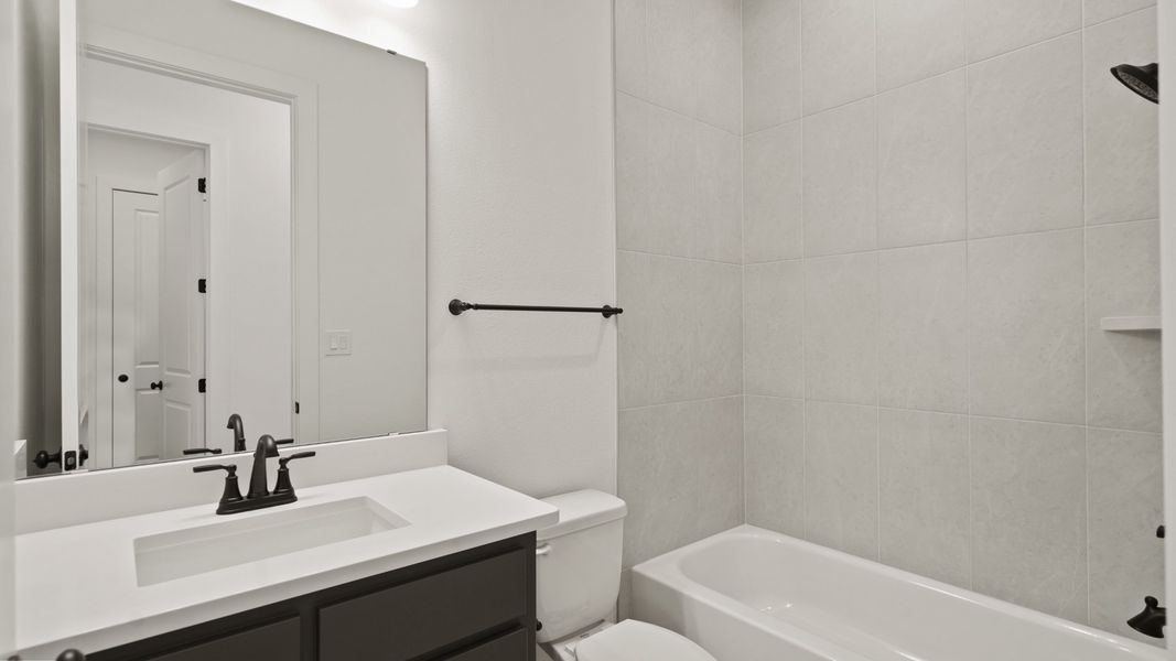 Furnished interior view inside a new home in Reserve at Berry Bay, Wimauma (Image 12).
