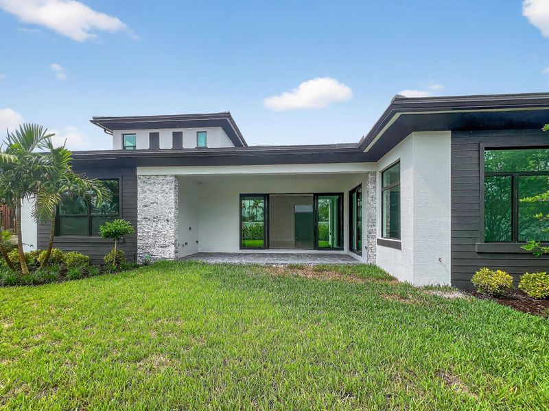 Front exterior of a new home in , Palm Beach Gardens, FL, highlighting curb appeal (Image 30).