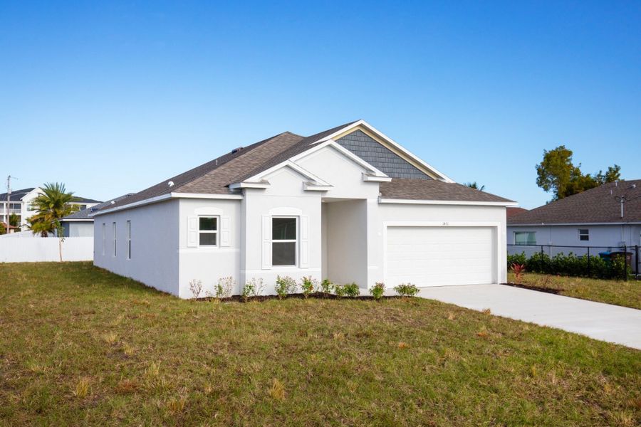 Front exterior of a new home in Cape Coral, Cape Coral, FL, highlighting curb appeal (Image 16).