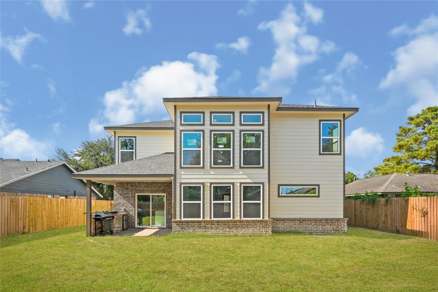Exterior details and patio area of a home in , Houston (Image 3).