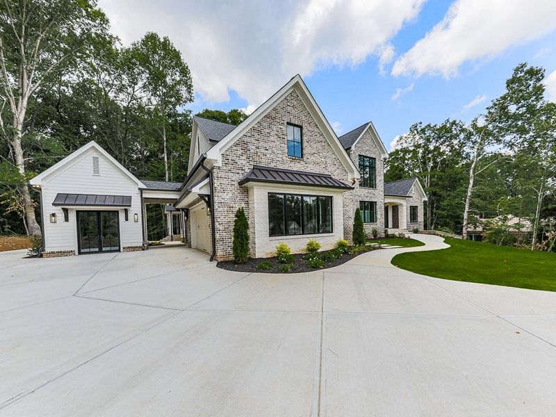 Front exterior of a new home in , Ball Ground, GA, highlighting curb appeal (Image 34).