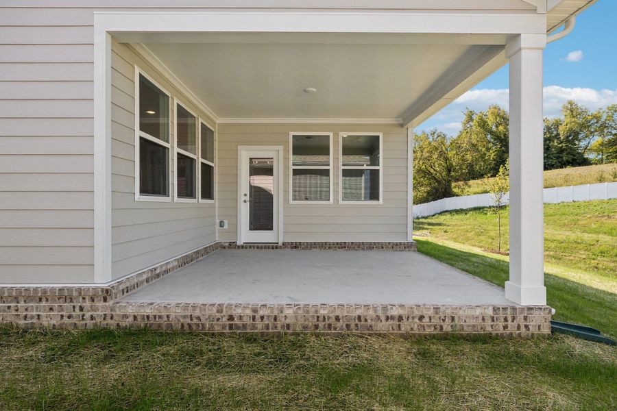 Exterior details and patio area of a home in Cedars at Cane Ridge | 55+ Community, Antioch (Image 22).