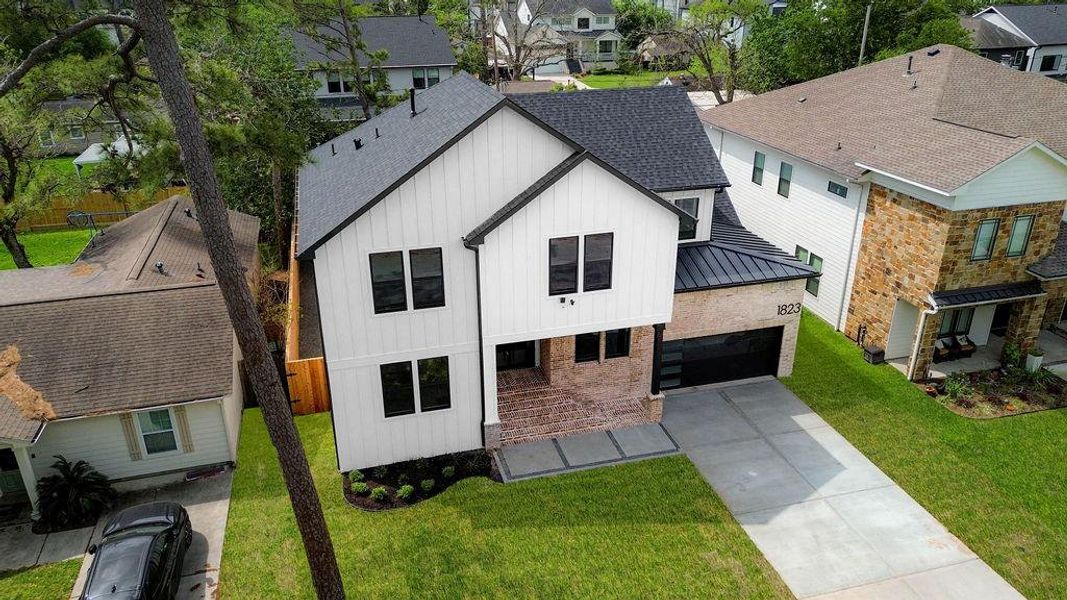 Front exterior of a new home in , Houston, TX, highlighting curb appeal (Image 25).