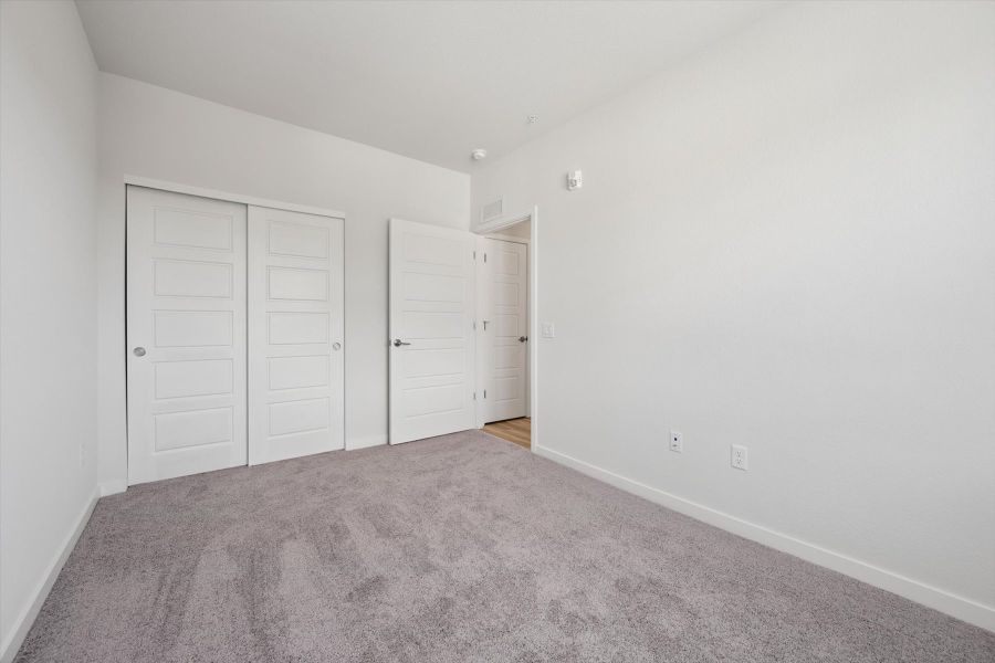 A room with white doors. A room with white doors.