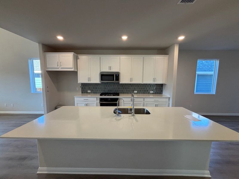 Furnished interior view inside a new home in Cannon Ranch 40s, Dripping Springs (Image 5).