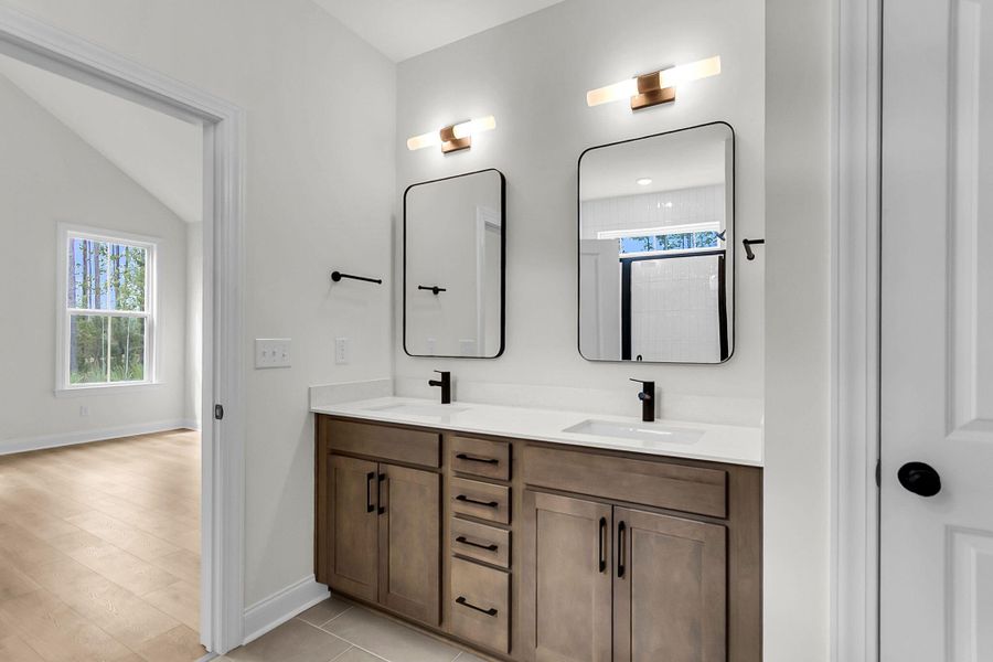 Furnished interior view inside a new home in Tidewater at Lakes of Cane Bay, Summerville (Image 11).