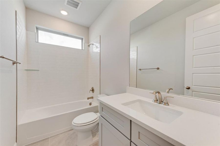 Furnished interior view inside a new home in Villages of Creekwood, Frisco (Image 10).